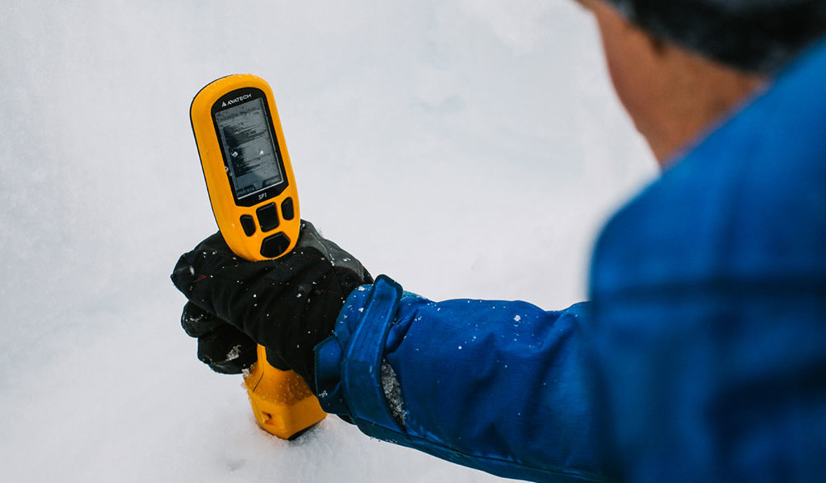 Measure snowpack structure, slope angle, and aspect with a probe. PHOTO: Avatech