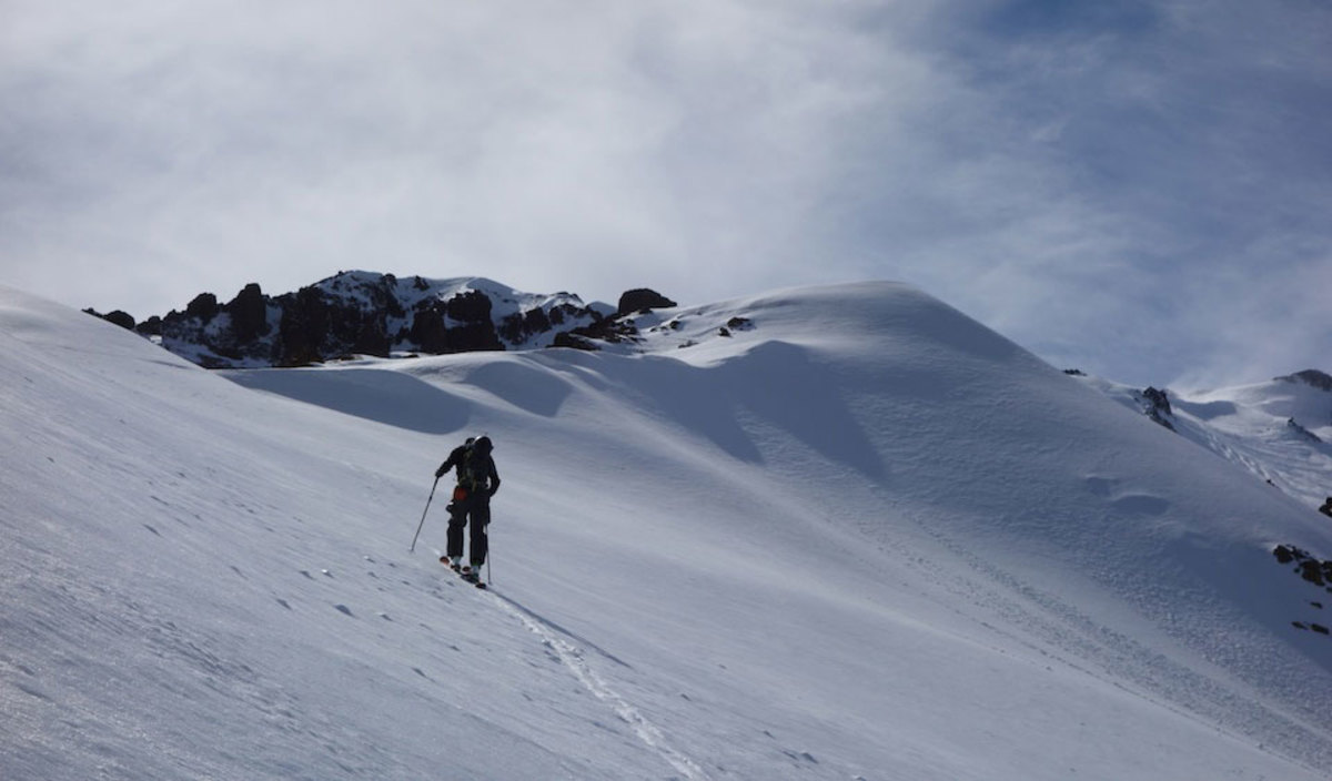 Drew Tabke hiking in Nevados de Chillan, searching for September skiing. PHOTO: Griffin Post