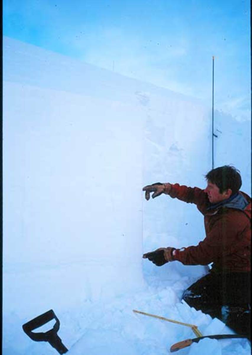 Jeremy Cox assesses the crown fracture left behind the January 2003 avalanche at La Traviata. PHOTO: B.C. Coroner