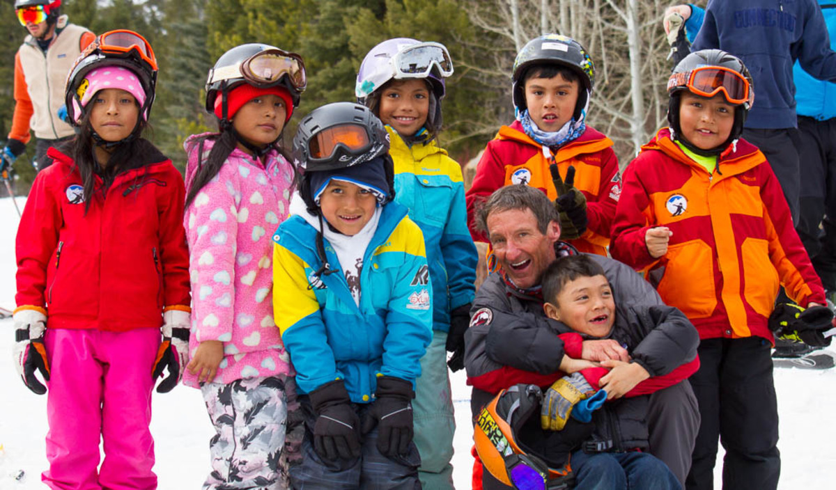 Dave "The Wave" with kids from The Doug Coombs Foundation. PHOTO: Emily Coombs