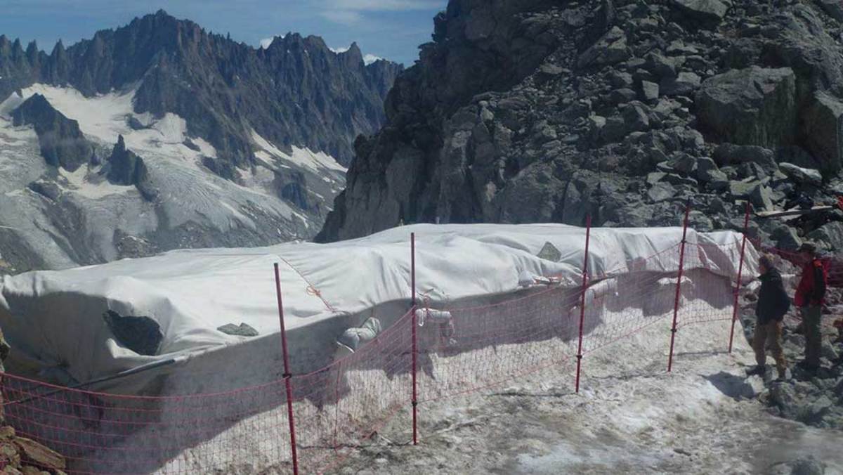 For the fifth summer, resort officials at Grands Montets covered the Rognon Glacier with a tarp, in an attempt to slow the rapid acceleration of snowmelt that is happening across the Alps. PHOTO: Luc Moreau