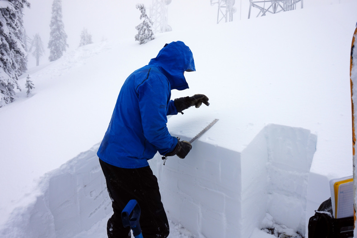 Mark Dundas, one of two new avalanche forecasters at the Flathead Avalanche Center, performs a stabilty test in the southern Whitefish Range of Montana. PHOTO: Courtesy of FAC