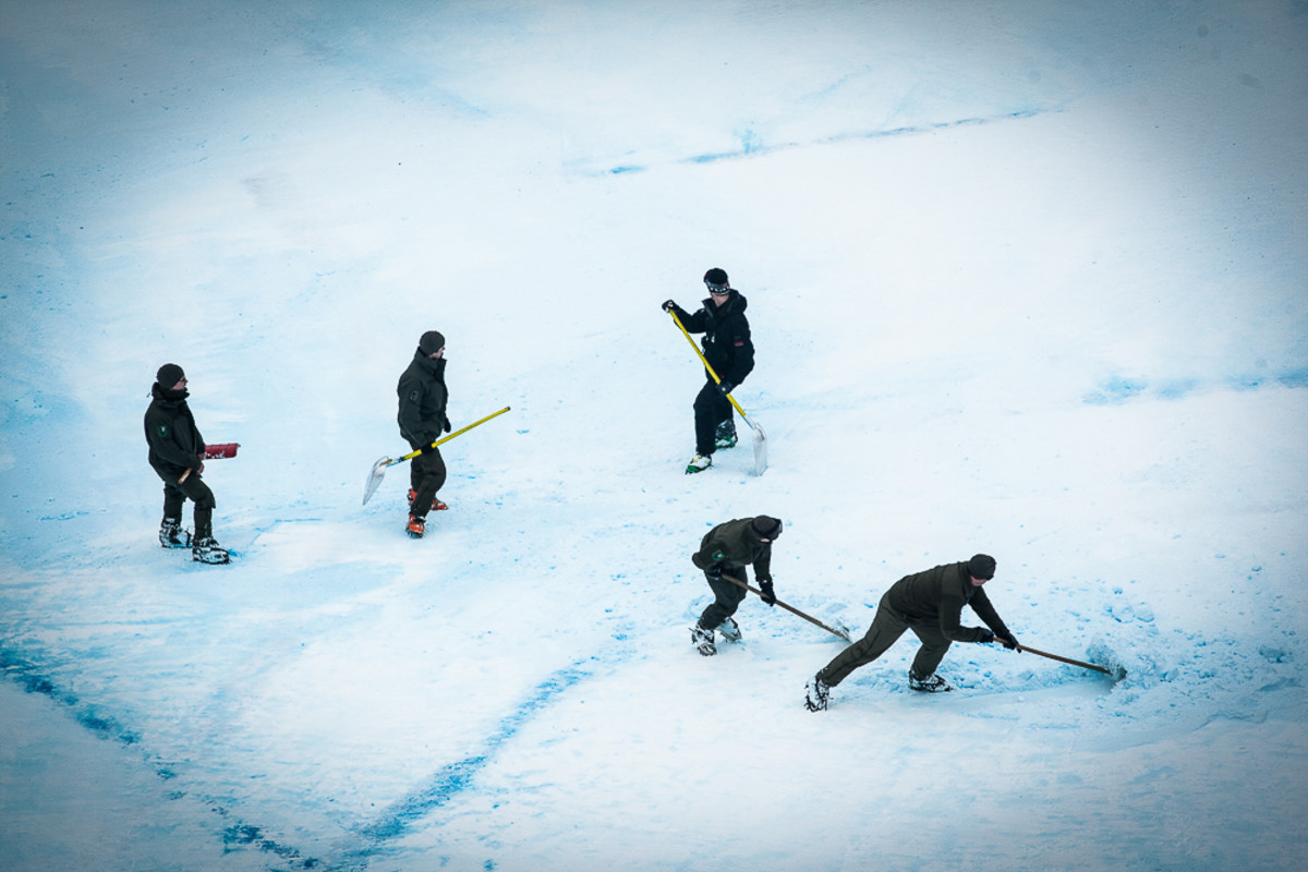 A crew does what they can to keep conditions safe on the course. PHOTO: David Reddick