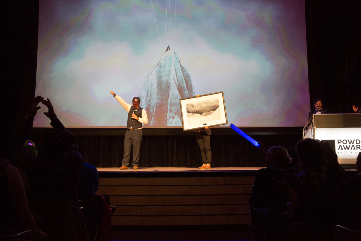 Roy Tuscany of the High Fives Foundation auctions off the Photo of the Year to raise money for injured athletes. PHOTO: David Reddick