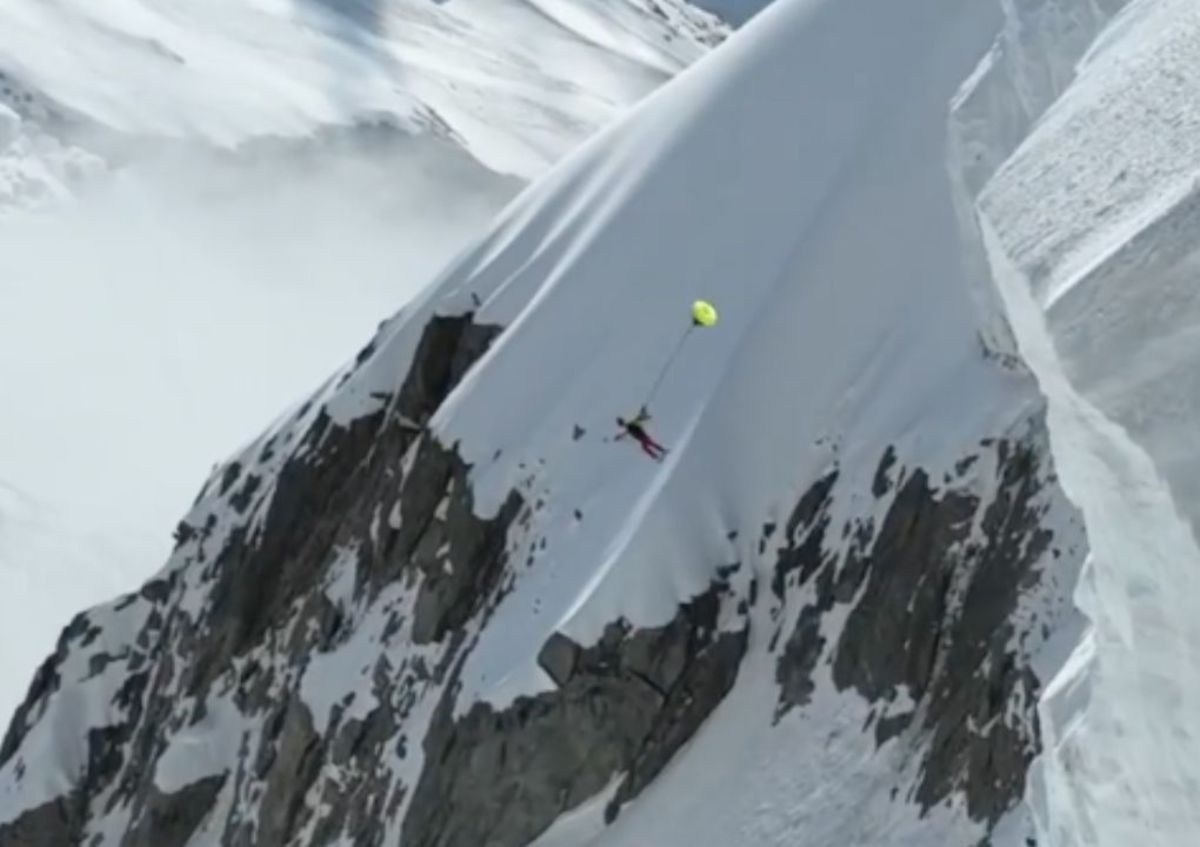Look Skier Holds On For Dear Life To Attempt Peak's First Ski BASE Jump