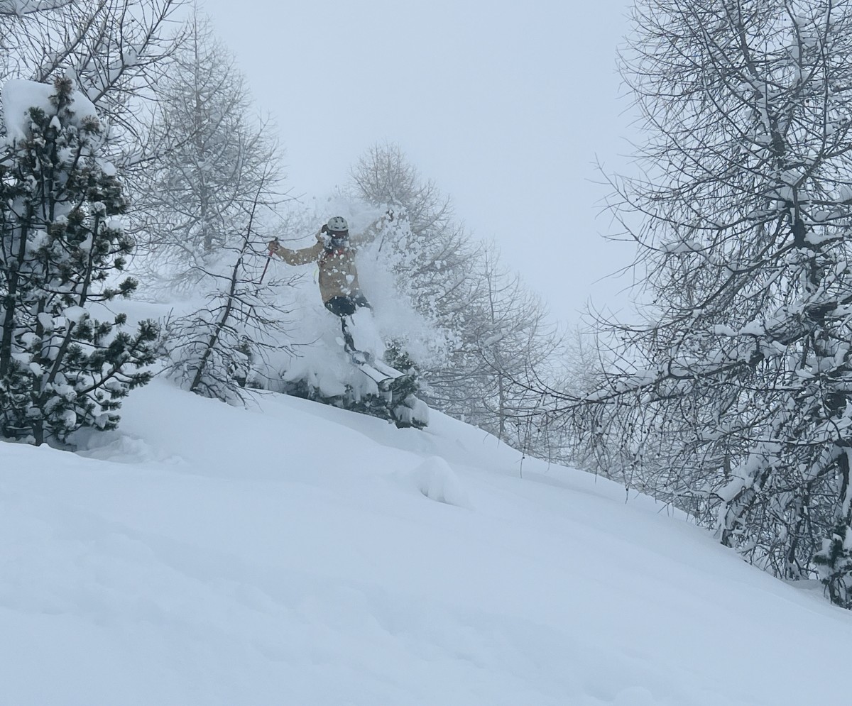 Skier Daryn Edmunds makes a jump on a powder day at Austrian ski resort Schlick 2000 near Innsbruck.