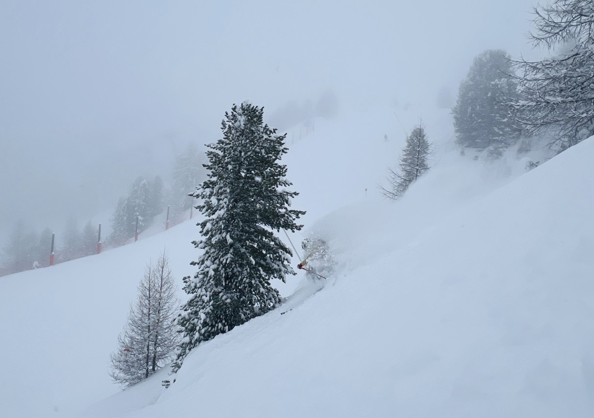 Skier Daryn Edmunds skis in a powder storm at Austrian ski resort Schlick 2000 near Innsbruck.