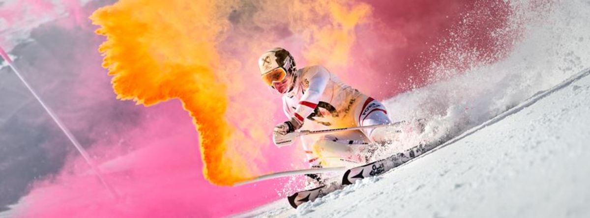 Skier makes turn with color