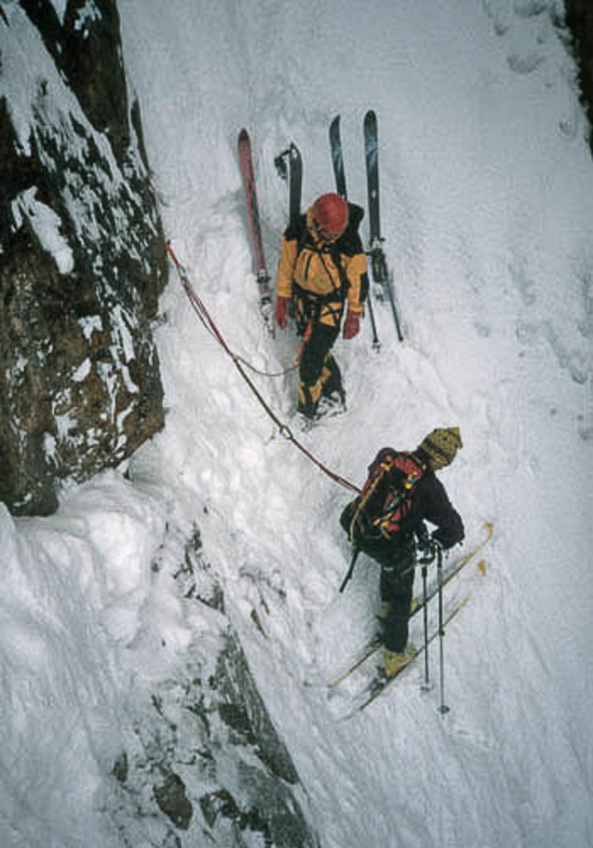 Hans Saari and Alex Lowe gearing up to ski the Becky/Chouinard Route in Montana. Both men were influential in climbing and skiing. Unfortunately, they paid the ultimate price to pursue their respective paths, Lowe passing in 1999, and Saari in 2001.