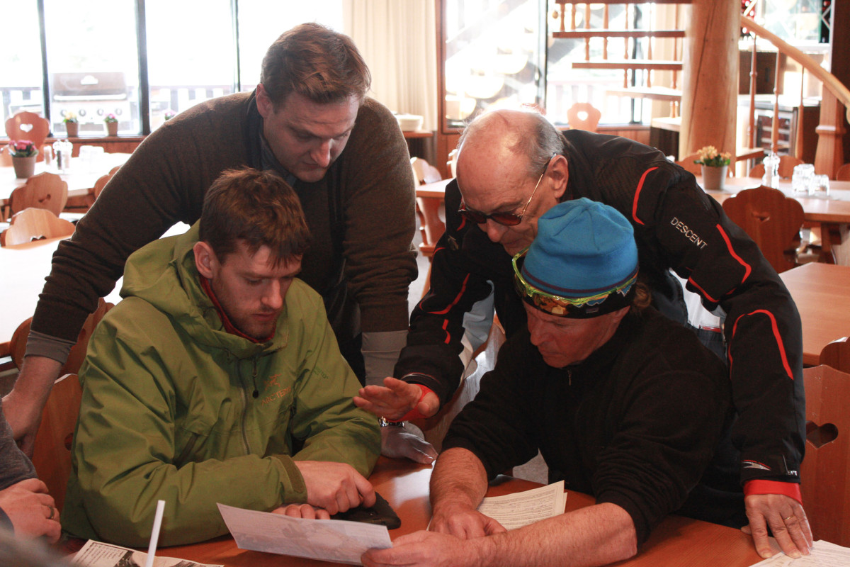 If everything goes according to schedule, Valemount could be open for skiing in December 2017. From left: Joe Nusse, Tomasso Oberti, Oberto Oberti, and the head guide of CMH Cariboo. PHOTO: Andru McCracken